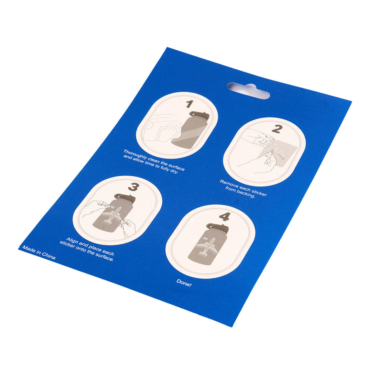 The Boeing Stores Boeing V-22 Osprey Motion Sticker features a blue instruction sheet with four step-by-step illustrations. Steps include cleaning the surface, peeling, placing the waterproof vinyl sticker, and finalizing. Made in China is noted at the bottom.