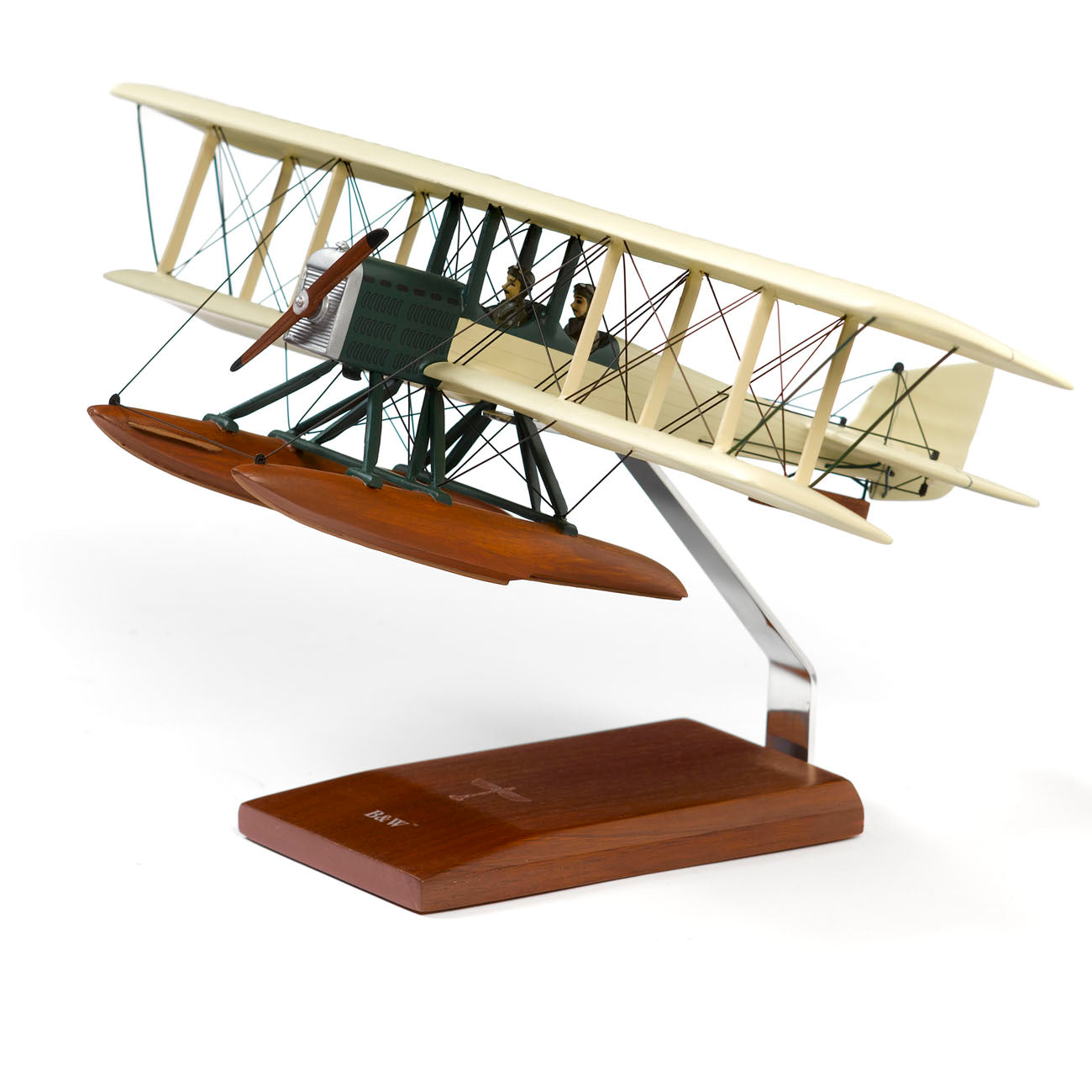 The Mastercraft Collection LLC Boeing B & W 1:32 Wood Model is a hand-crafted vintage biplane seaplane with floats, displayed on a wooden stand, featuring twin wings, front propeller, detailed struts, and rigging.