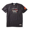 The Boeing Stores Red Canoe Boeing Tuskegee Airmen T-Shirt features a P-51 Mustang WWII airplane graphic. Above it, Tuskegee Airmen is emblazoned, with Red Tail Squadron NAA P-51 Mustang below. A red patch with 99 adorns the left sleeve.