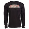 The Boeing Stores Heritage Mens Long Sleeve T-Shirt features a vintage Boeing Airplane Co. logo on premium black fabric. A distressed background amplifies the timeless white and red text, creating a stylish vintage look.