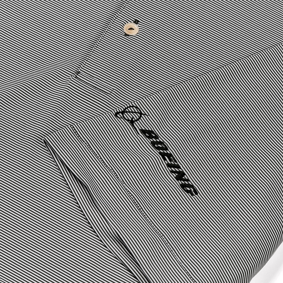 Peter Millar Boeing Jubilee Stripe Performance Polo Iron Logo Close Up