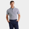 Product image featured on a male model with the shirt tucked in navy chino pants.
