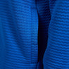 Close-up of pocket detail on Callaway quarter-zip shirt