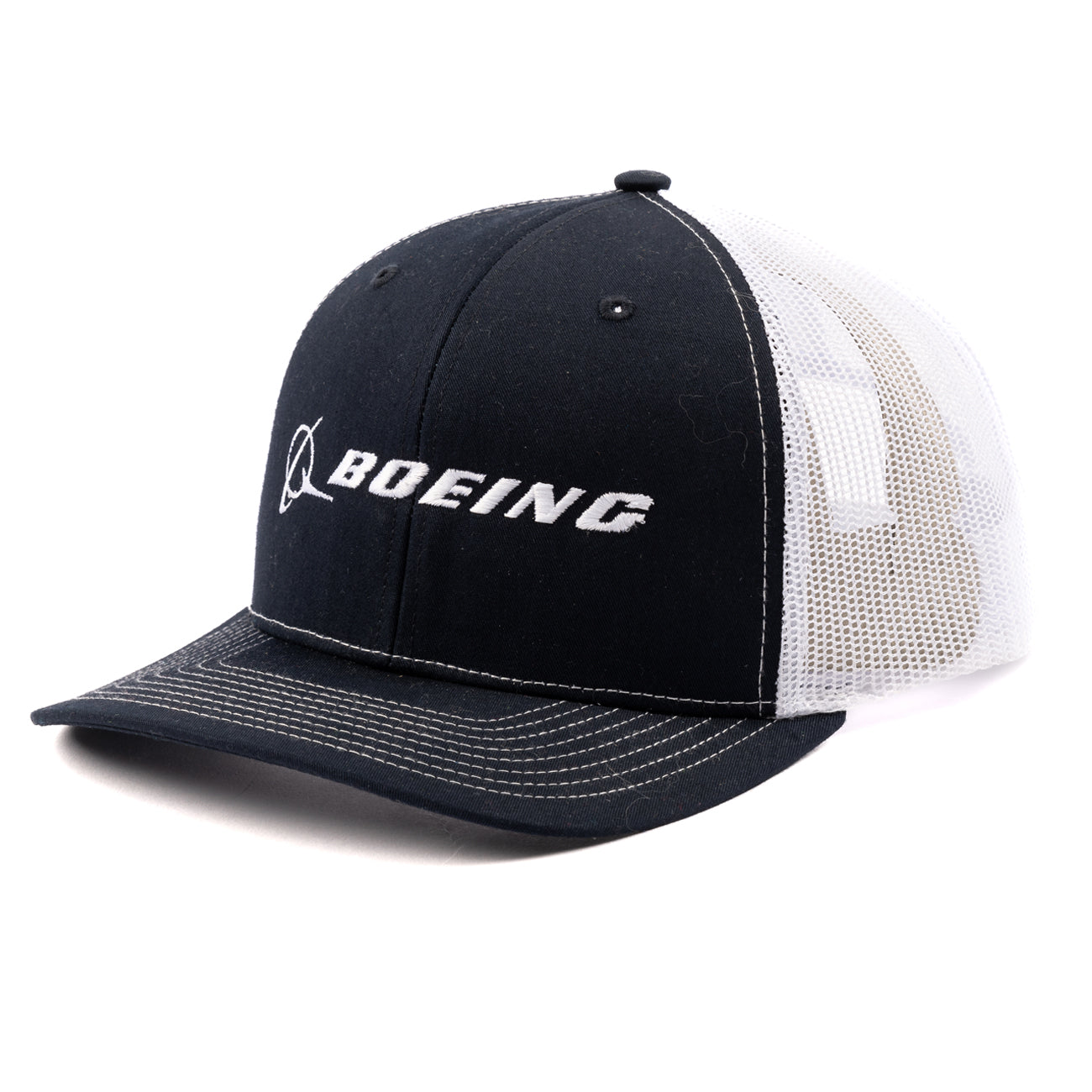 The Boeing Stores Richardson Trucker Hat features the Boeing Signature Logo in white stitching on a solid black front and brim, with a white mesh back and adjustable snapback closure.