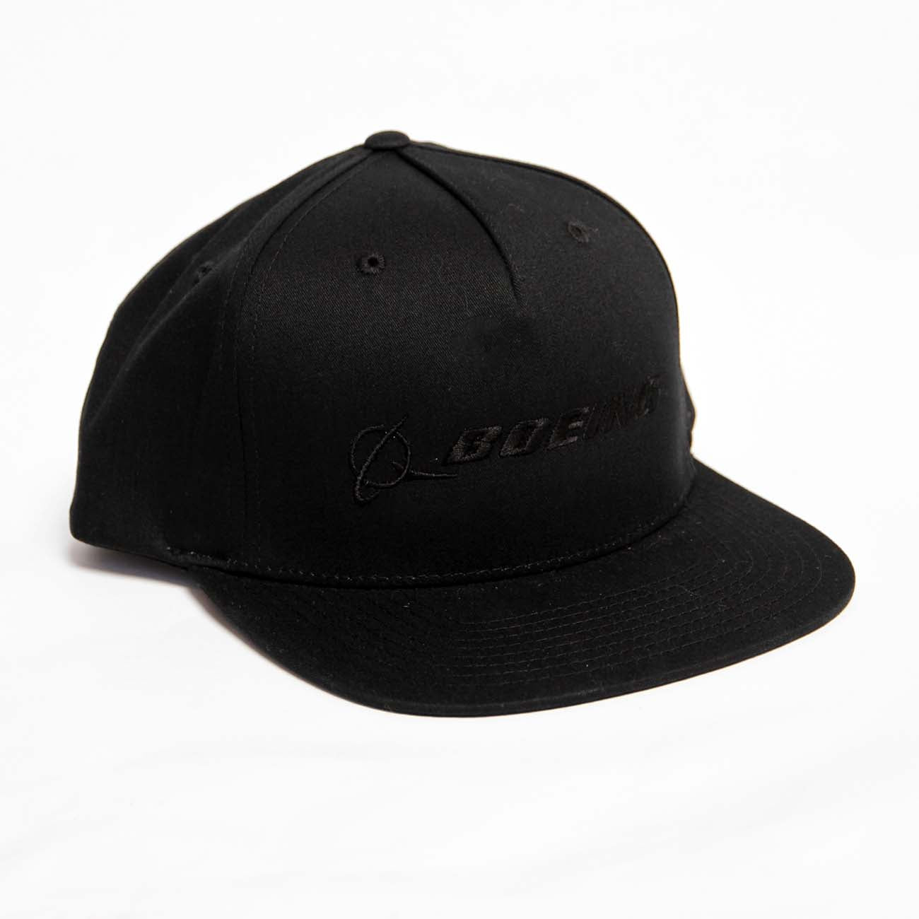 The Boeing Store Richardson Boeing Signature Logo Flat Bill Hat is a black baseball cap featuring an embroidered black Boeing logo on the front, with six panels and a sleek snapback closure for a perfect fit.
