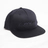 The Richardson Boeing Signature Logo Flat Bill Hat by The Boeing Store is a black cap with a flat bill. It features the black embroidered Boeing logo on a white background at the front and includes a snapback closure for adjustable fit.