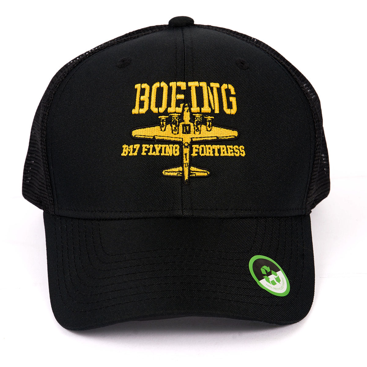 The Boeing Stores Boeing B-17 Flying Fortress Heritage Hat is a black mesh cap made from recycled polyester, featuring yellow BOEING B17 FLYING FORTRESS embroidery, a bomber image on the front, and a green circular sticker on the brim.