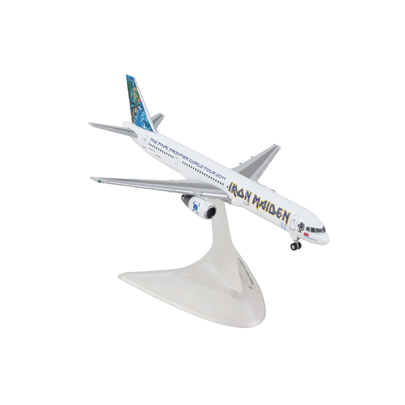 The Daron Iron Maiden Boeing 757-200 Final Frontier World Tour 1:500 Model is displayed on a white stand, showcasing band branding and intricate artwork inspired by The Final Frontier album, with a predominantly white exterior.