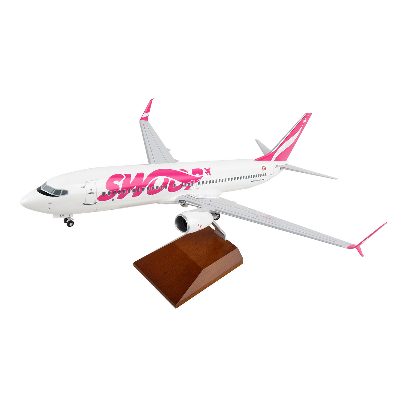 The Daron Swoop Boeing 737-800 1:100 Model features a white and pink livery, comes with a wooden display stand, and is perfect for collectors.