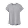 The Boeing Stores Peter Millar Women’s Lunar Short-Sleeve Performance Tee is a plain, short-sleeved gray shirt on a white background. It features a classic round neckline, slightly curved hem, antimicrobial fabric to keep you fresh, and UPF 50+ sun protection for sunny days.