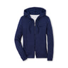 The Boeing Stores Peter Millar Women’s French Terry Full-Zip Hoodie in blue has a hood, adjustable drawstrings, and is made from performance fabric. It features a subtle textured pattern with 4-way stretch and moisture-wicking properties. It has long sleeves with ribbed cuffs against a white background.