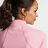 Showing top half of the backside on a female model.  Peter Millar logo in the center in between the shoulders. 