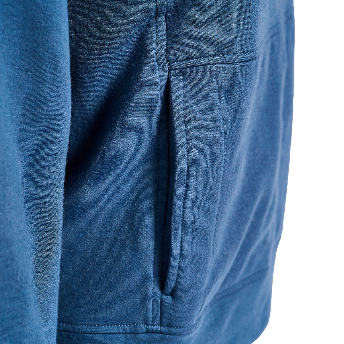 Close-up of The Boeing Stores Glyder Boeing Womens Daily Quarter-Zip Pullover in blue, showcasing visible stitching on the side pocket and the soft ISOSOF™ plush fabric.