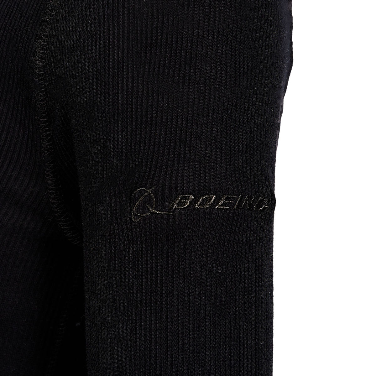 The Glyder Boeing Womens Ruby Mock-Neck Long-Sleeve by The Boeing Store features a black ribbed sleeve with BOEING embroidered near the shoulder, adding a touch of elegance to your outfit.