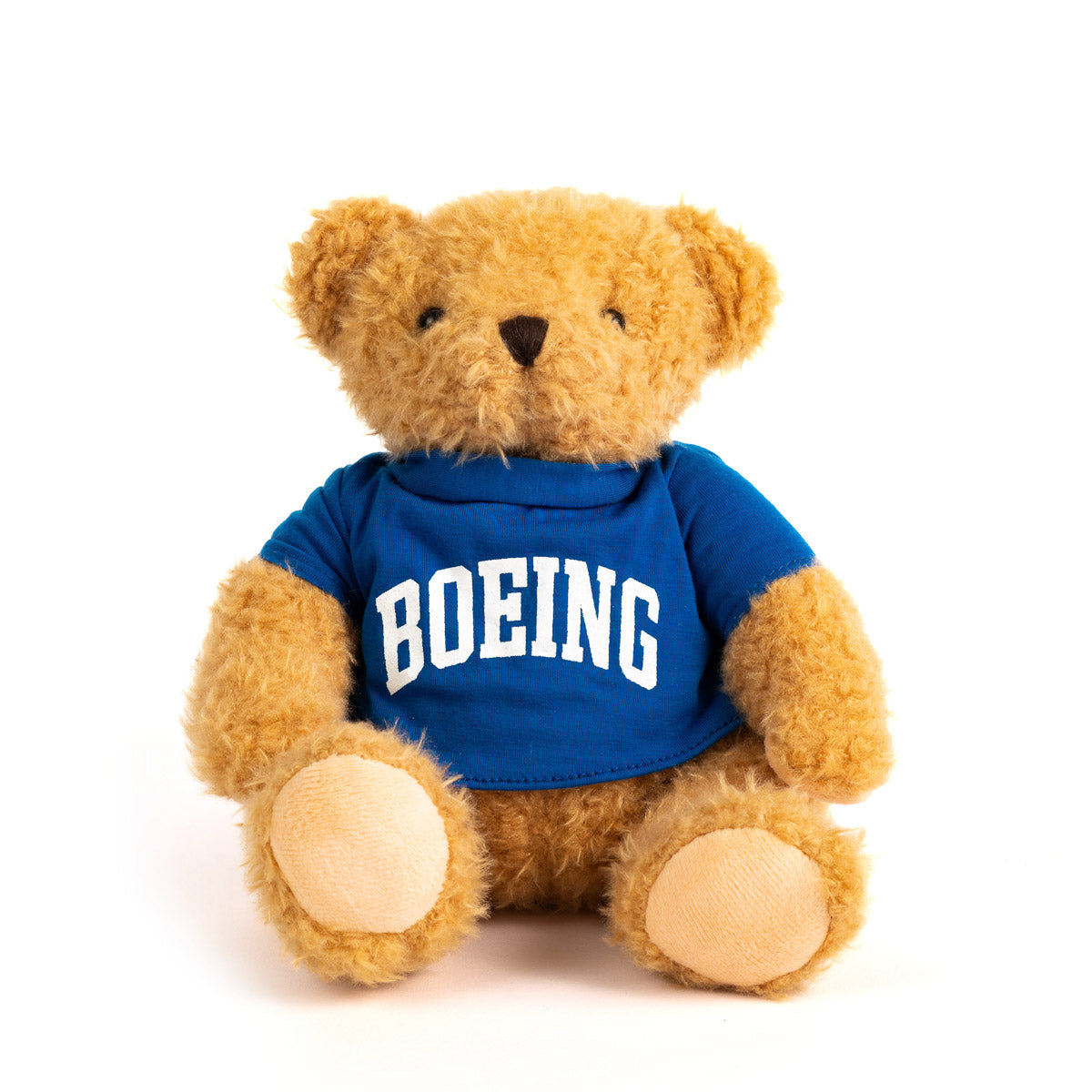 Golden fur bear wearing royal t-shirt with white Boeing varsity logo across the chest.