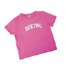 The Boeing Varsity Logo Toddler T-Shirt from The Boeing Store features a bold white varsity logo on a pink, 100% cotton T-shirt, laid flat against a plain white background, embodying aviation adventure.