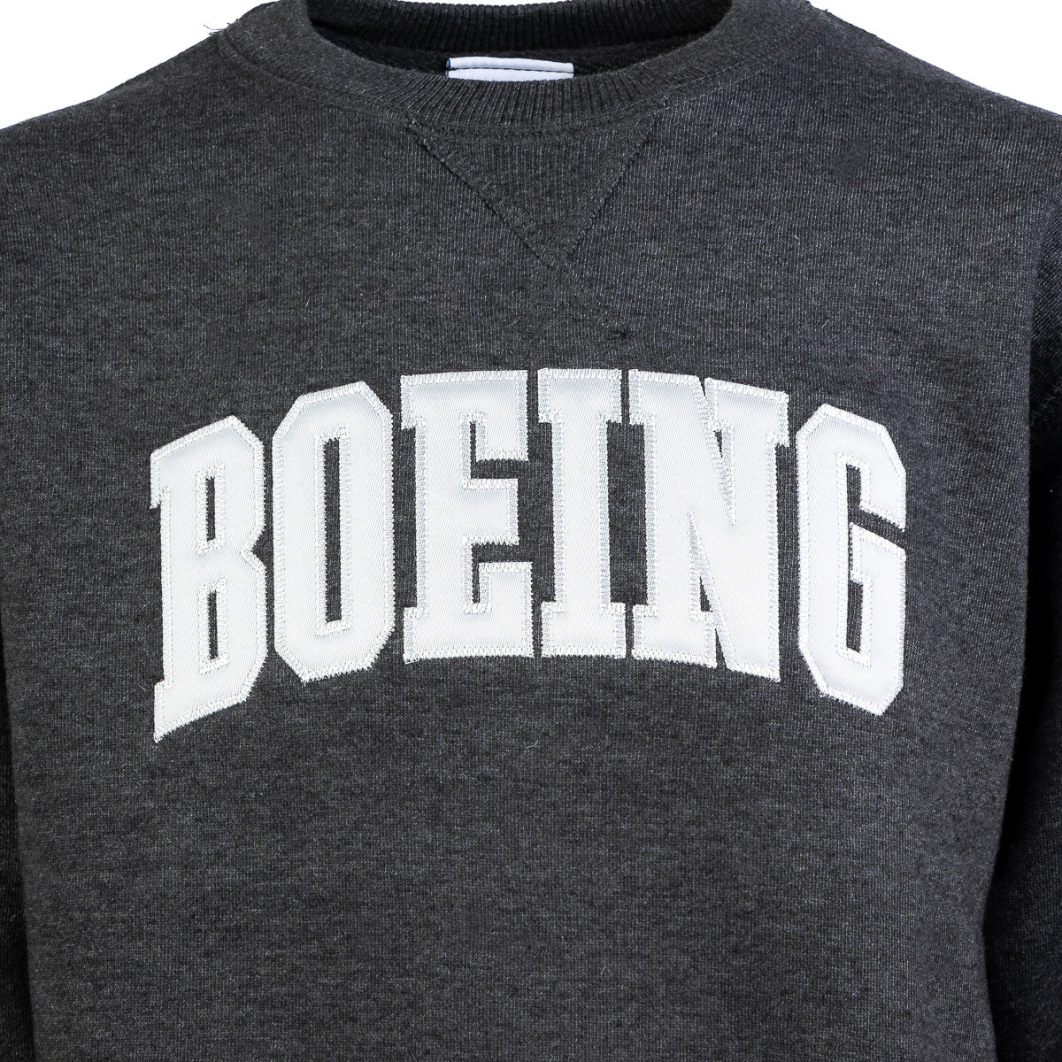 Close up the crewneck sweater in a heather charcoal color.   White Boeing varsity logo across the chest