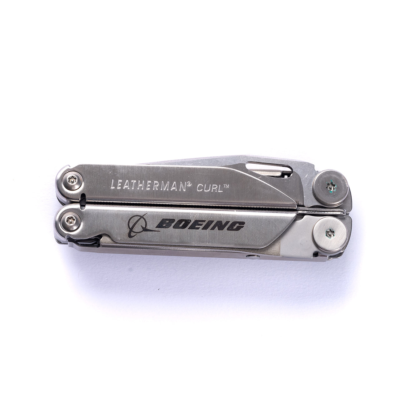 The Boeing Leatherman Curl, featuring Leatherman Curl on one side and the Boeing logo on the other, comes with a pocket clip and is photographed against a white background. Brand: The Boeing Store.