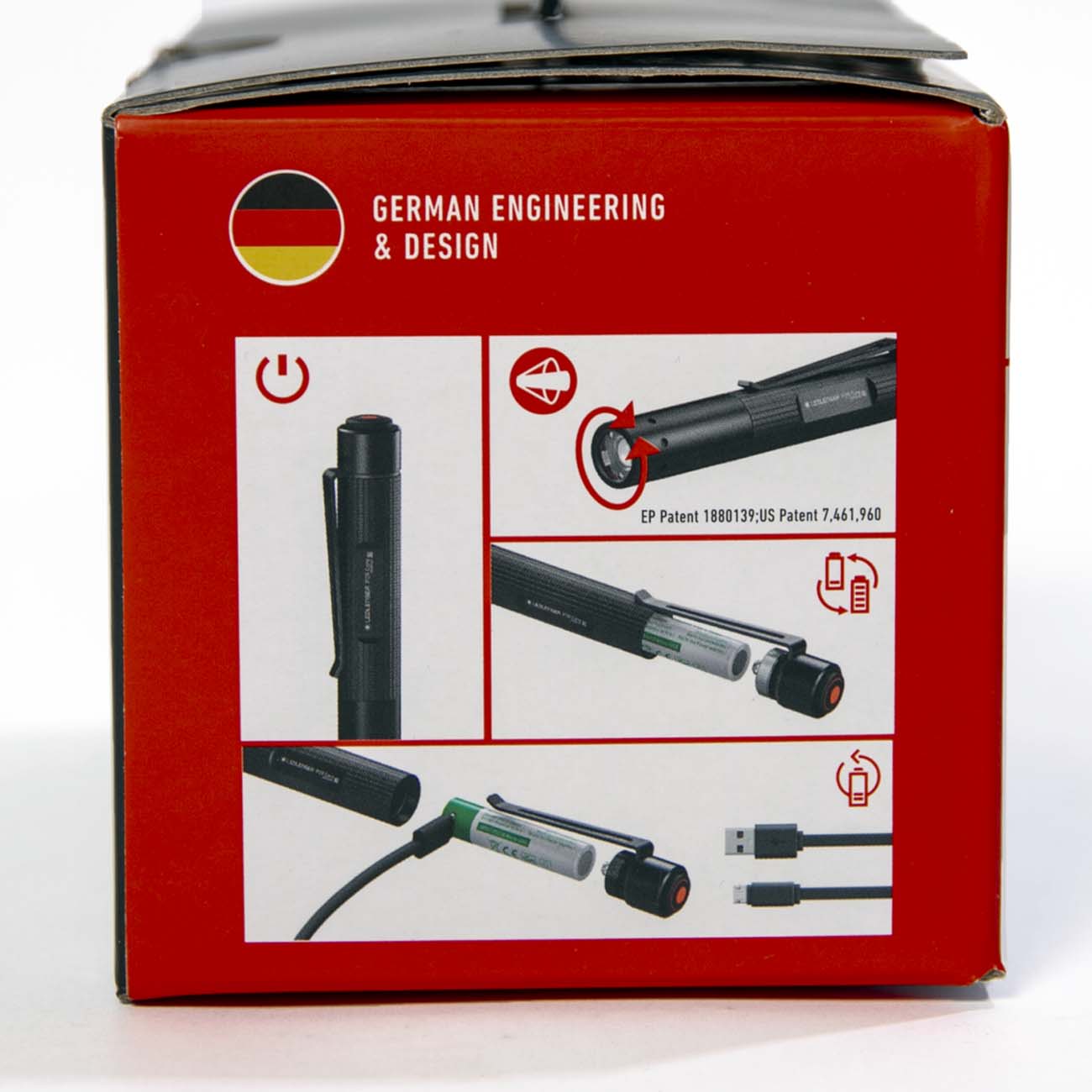 Red product box with the German flag and "German Engineering & Design" text. Features The Boeing Store’s Boeing Ledlenser P2R Core Flashlight: showing cap twist, part insertion, USB charging; icons and patent numbers included.
