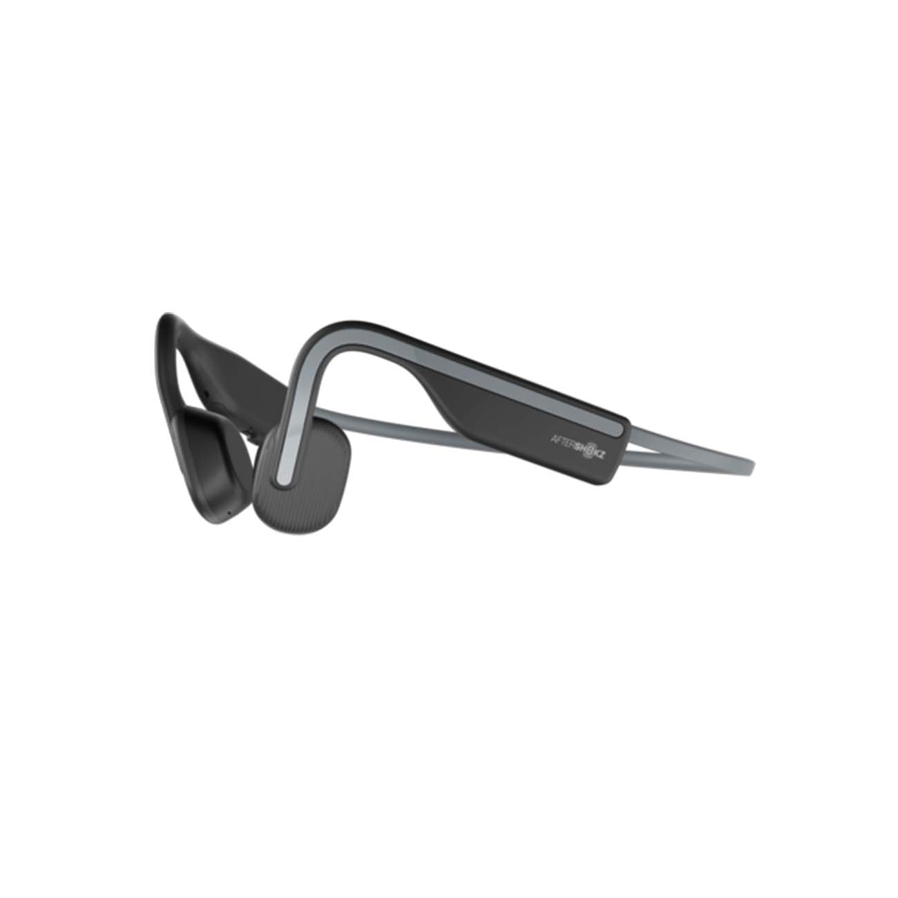 Sophisticated black Shokz™ OpenMove Headset from The Boeing Store, showcasing a modern open-ear design with a minimalist frame. The side displays branding, and Bluetooth v5.0 ensures seamless connectivity without traditional earbuds.