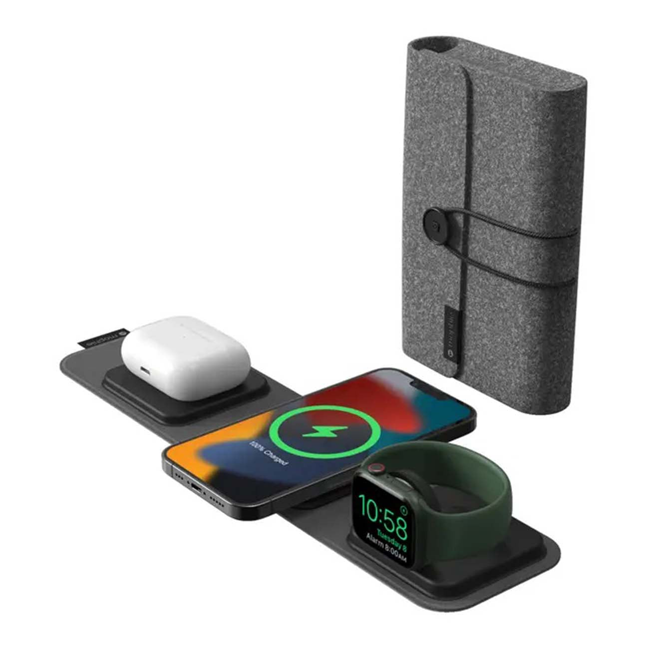 The Mophie Boeing 3-in-1 Travel Charger by The Boeing Store is a gray, fabric-covered, foldable device featuring wireless charging slots for AirPods, a smartphone, and a smartwatch. USB ports are included, and it comes with a rolled-up case.