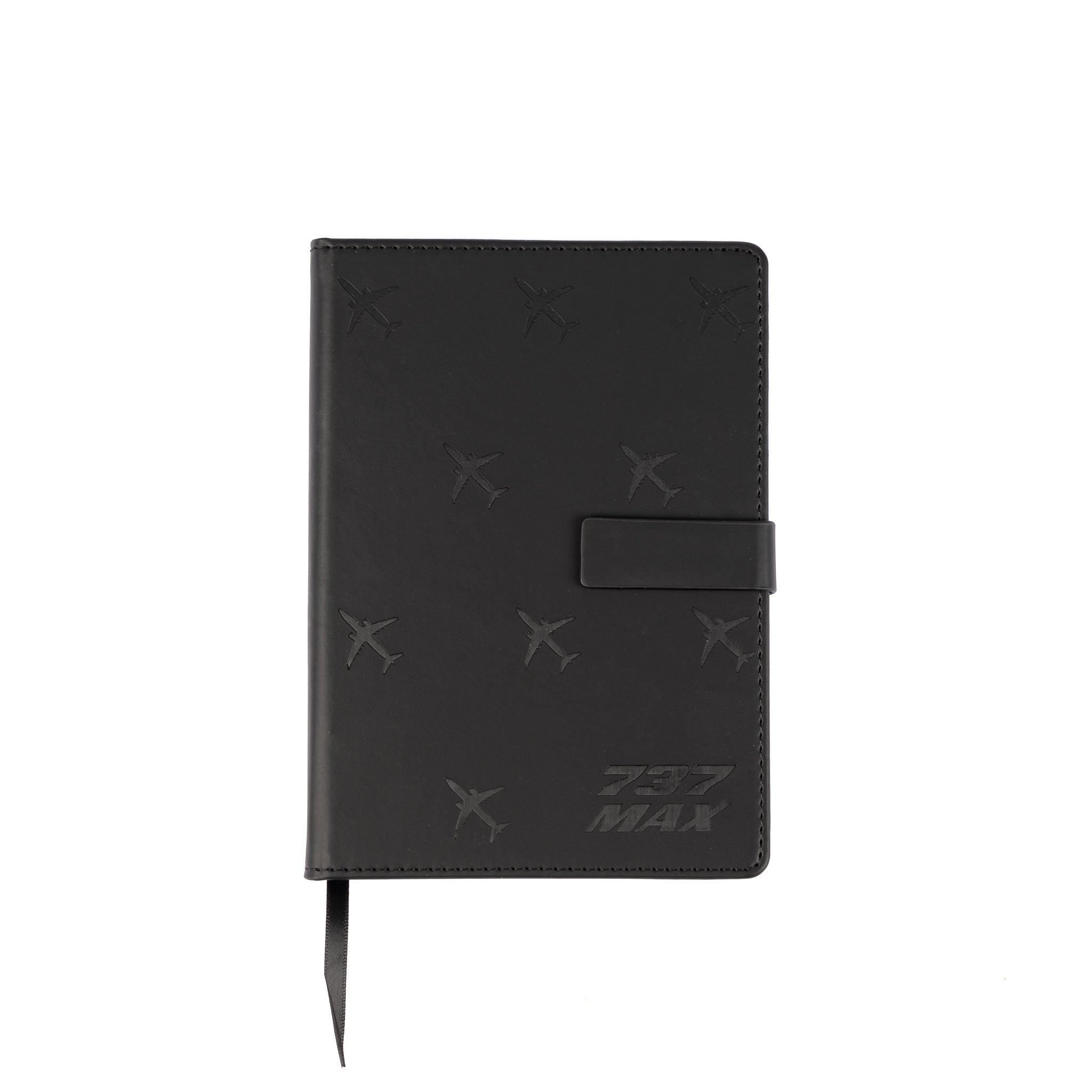 The Boeing Store’s Boeing 737 MAX Notebook features a black PU hardcover with embossed aircraft shapes and 737 MAX text, inspired by the Boeing program. It includes a strap closure and ribbon bookmark.