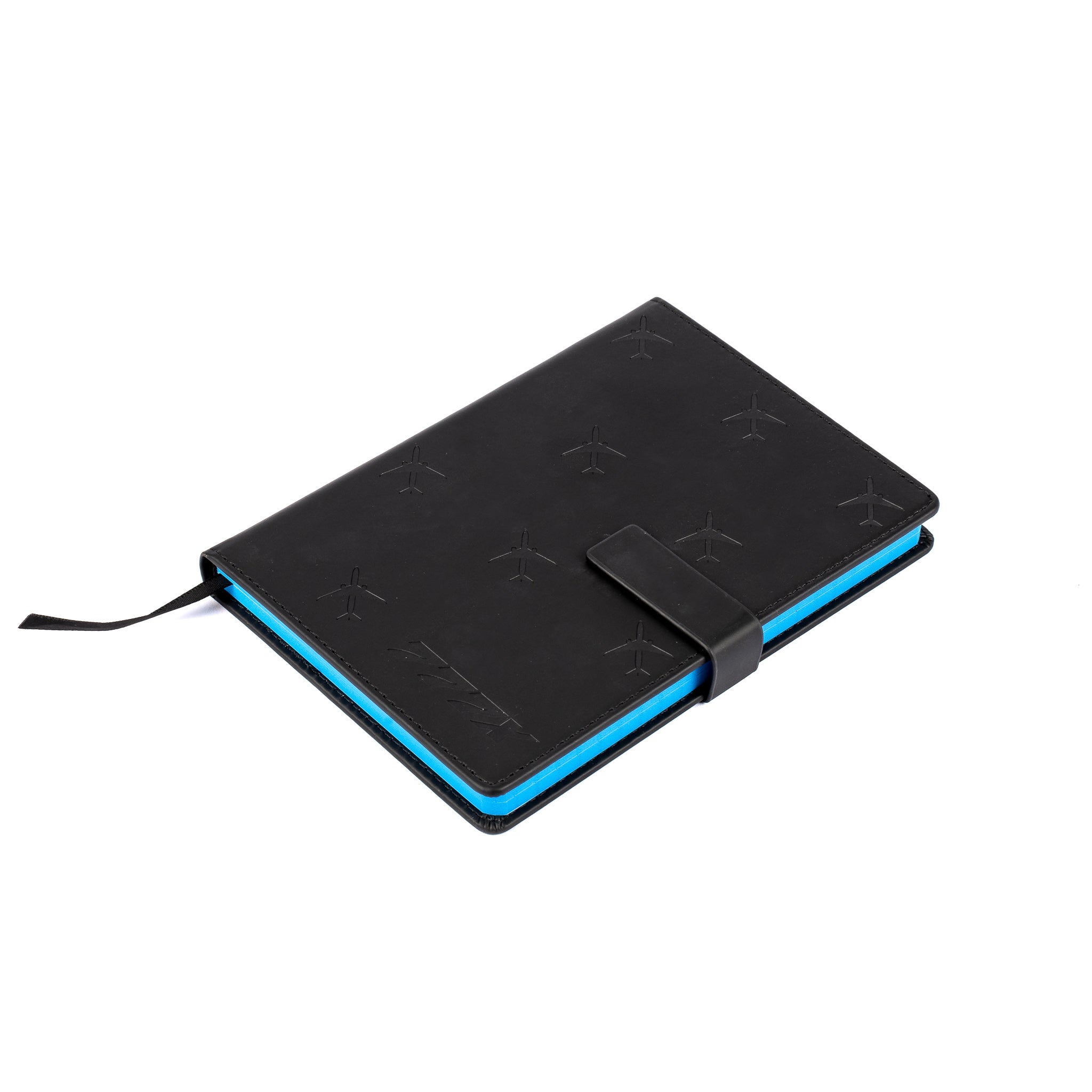 The Boeing Store’s Boeing 777X Notebook features a black cover with flap closure, subtle embossed aircraft-inspired pattern, bright blue page edges, and a black ribbon bookmark, displayed on a white background.
