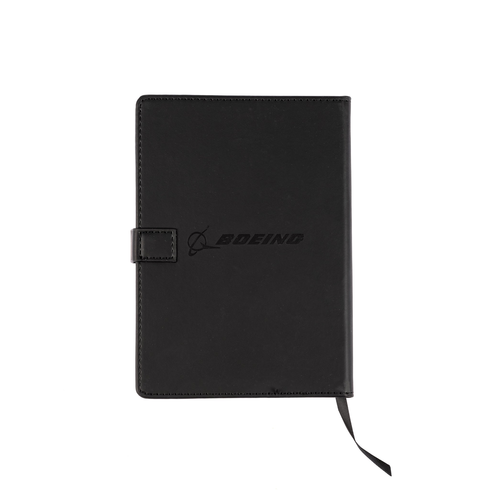 The Boeing Store’s Boeing 737 MAX Notebook is a closed black PU hardcover notebook with a clasp, embossed Boeing logo, subtle aircraft shape design on the front, and a black ribbon bookmark extending from the bottom.