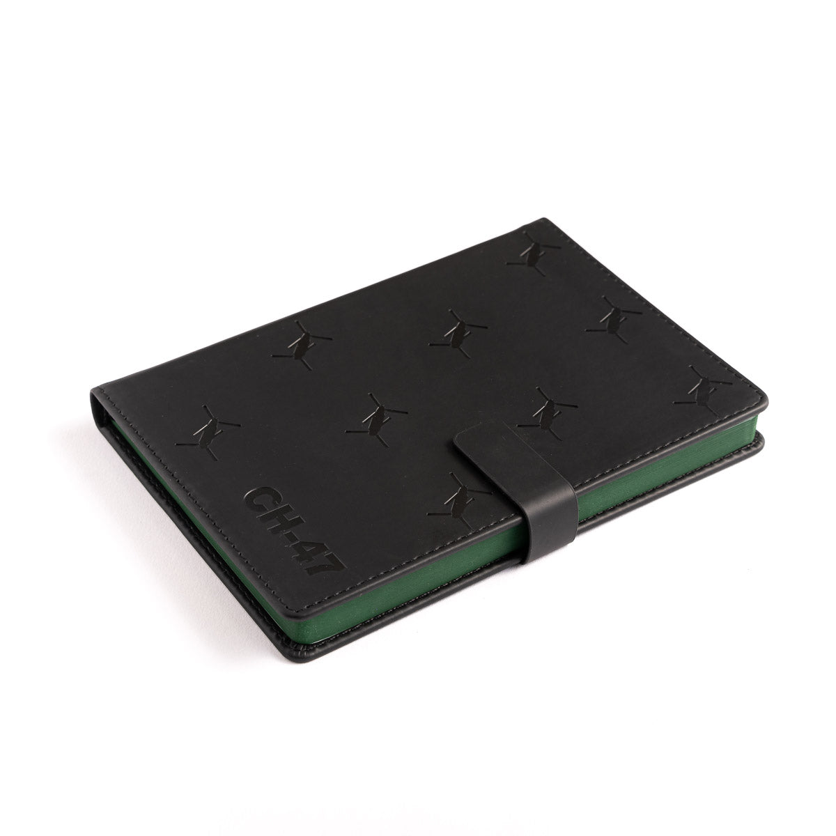 The Boeing Stores Boeing CH-47 Chinook Notebook is a black PU leather notebook with embossed star patterns and CH-47 text, featuring a green interior like Boeing aircraft, and a black strap closure, angled on a white background.