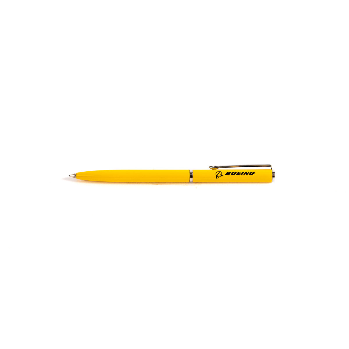 A sleek Boeing Mini Slim Ballpoint Pen, yellow with a silver clip and Boeing logo in black, crafted from brass by The Boeing Store, lies horizontally on a plain white background.