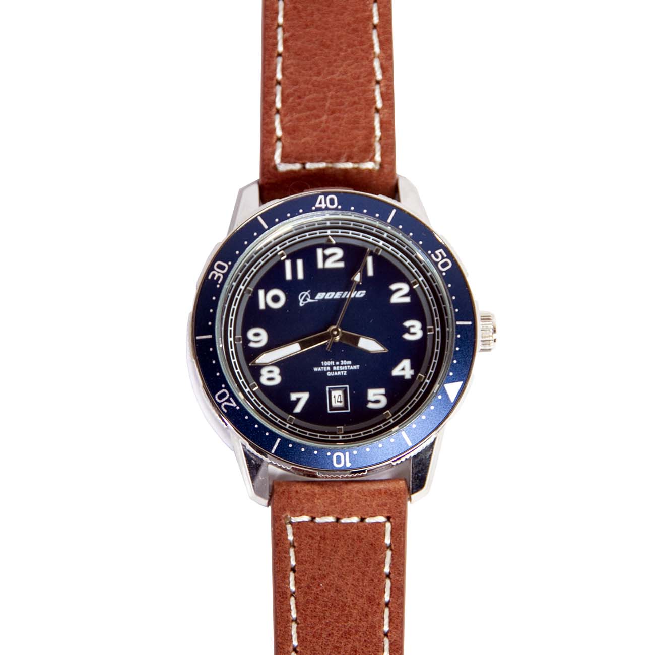 The Boeing Stores Boeing Brown Leather Watch features a brown leather band, blue face with white numerals, date window, and silver bezel with minute markers. It includes Japanese movement in a durable stainless steel case.
