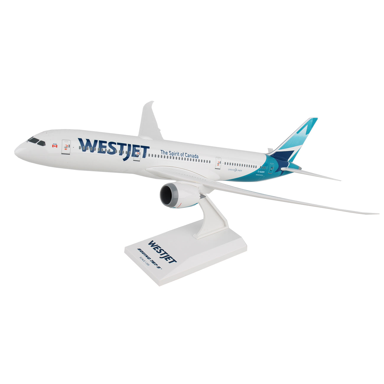 The WestJet Airlines Boeing 787-9 1:200 Model by Daron features a white fuselage adorned with WestJets logo, teal accents on its tail and wingtips, and stands on a display. Labeled The Spirit of Canada, this detailed model is perfect for collectors.