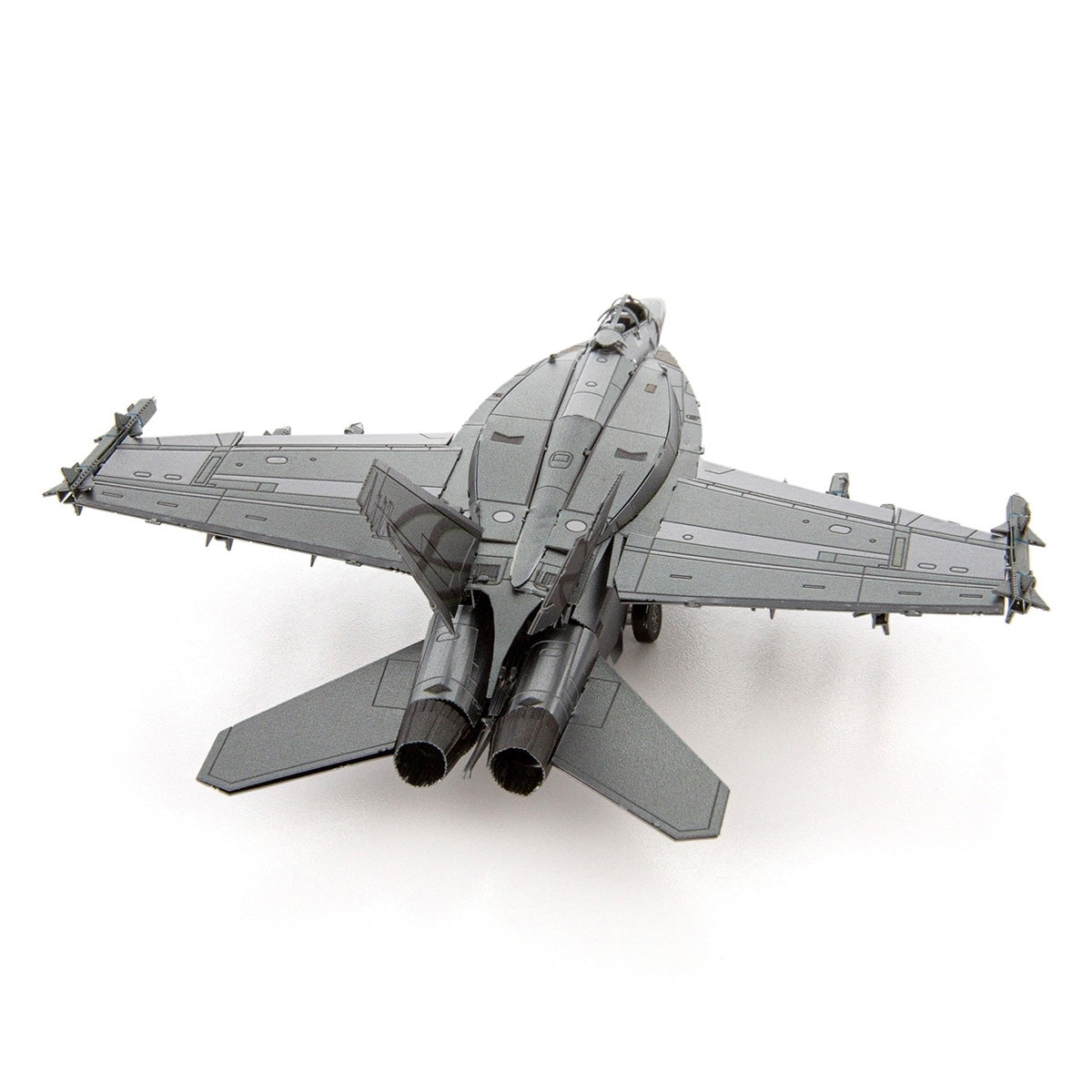 The Boeing Store’s Metal Earth Boeing F/A-18 Super Hornet model is shown from the rear, highlighting twin engines, sleek wings, and detailed panel lines against a plain white background.