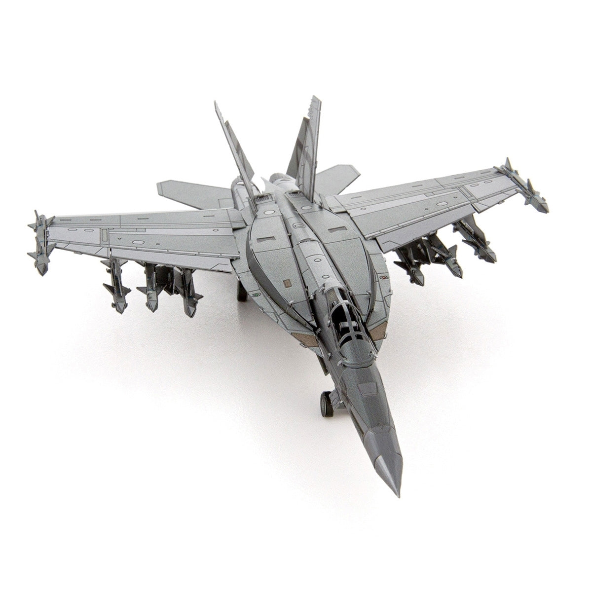 The Boeing Store’s Metal Earth Boeing F/A-18 Super Hornet model, in gray with twin tails and multiple missiles under the wings, is displayed from a front angle on a white background.