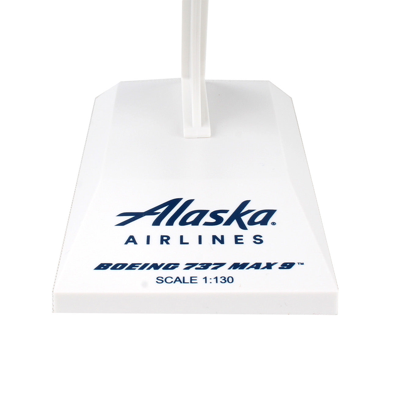 Detailed view of the Alaska Airlines Boeing 737 MAX 9 (1:130 scale) collectors model stand base. The white base from Daron prominently displays the airlines logo and model text.