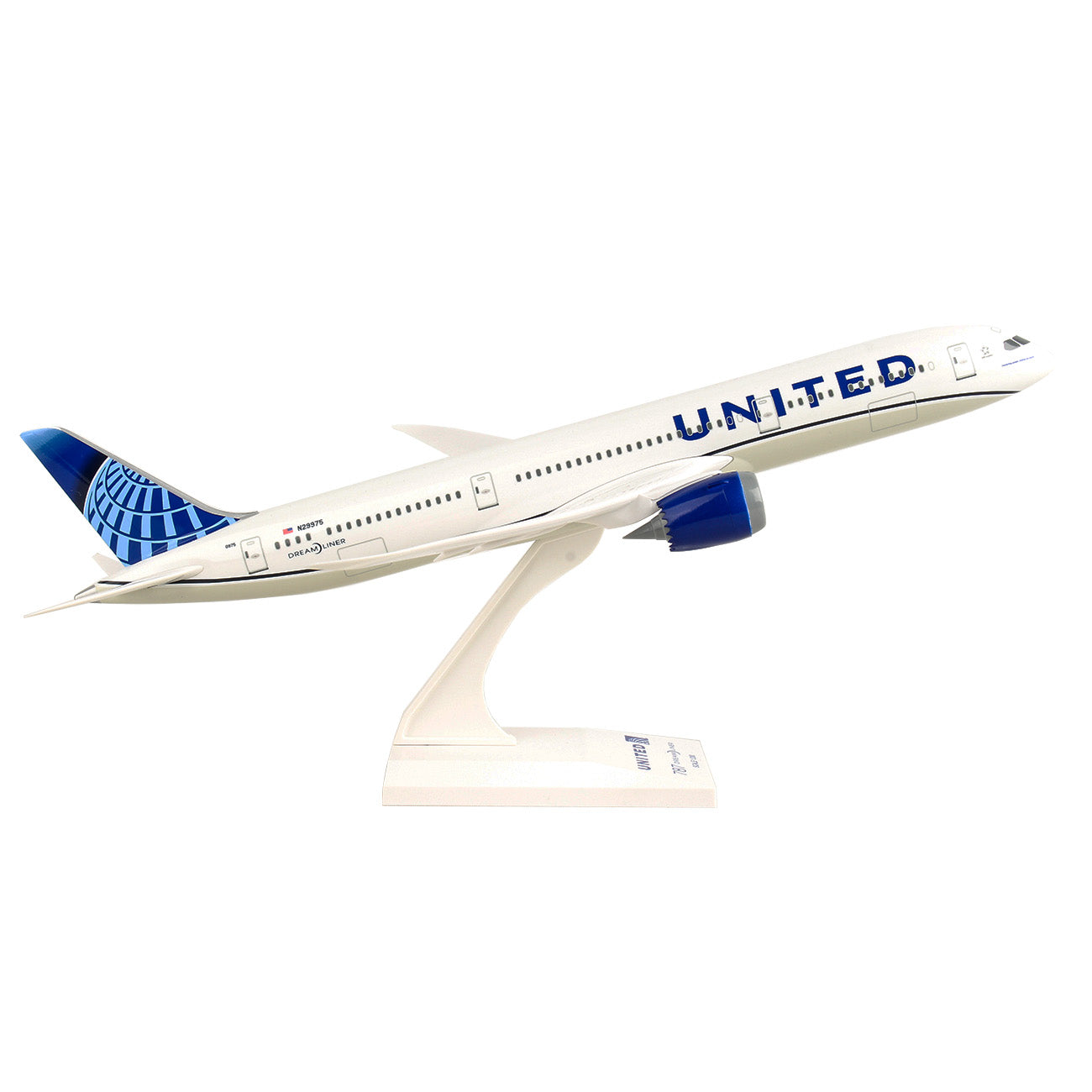 The Daron United Airlines Boeing 787-9 1:200 model features a white fuselage with blue accents, the UNITED logo on the side, and a stylized blue globe on the tail. It’s ideal for collectors, mounted on an upward-angled stand, simulating takeoff.