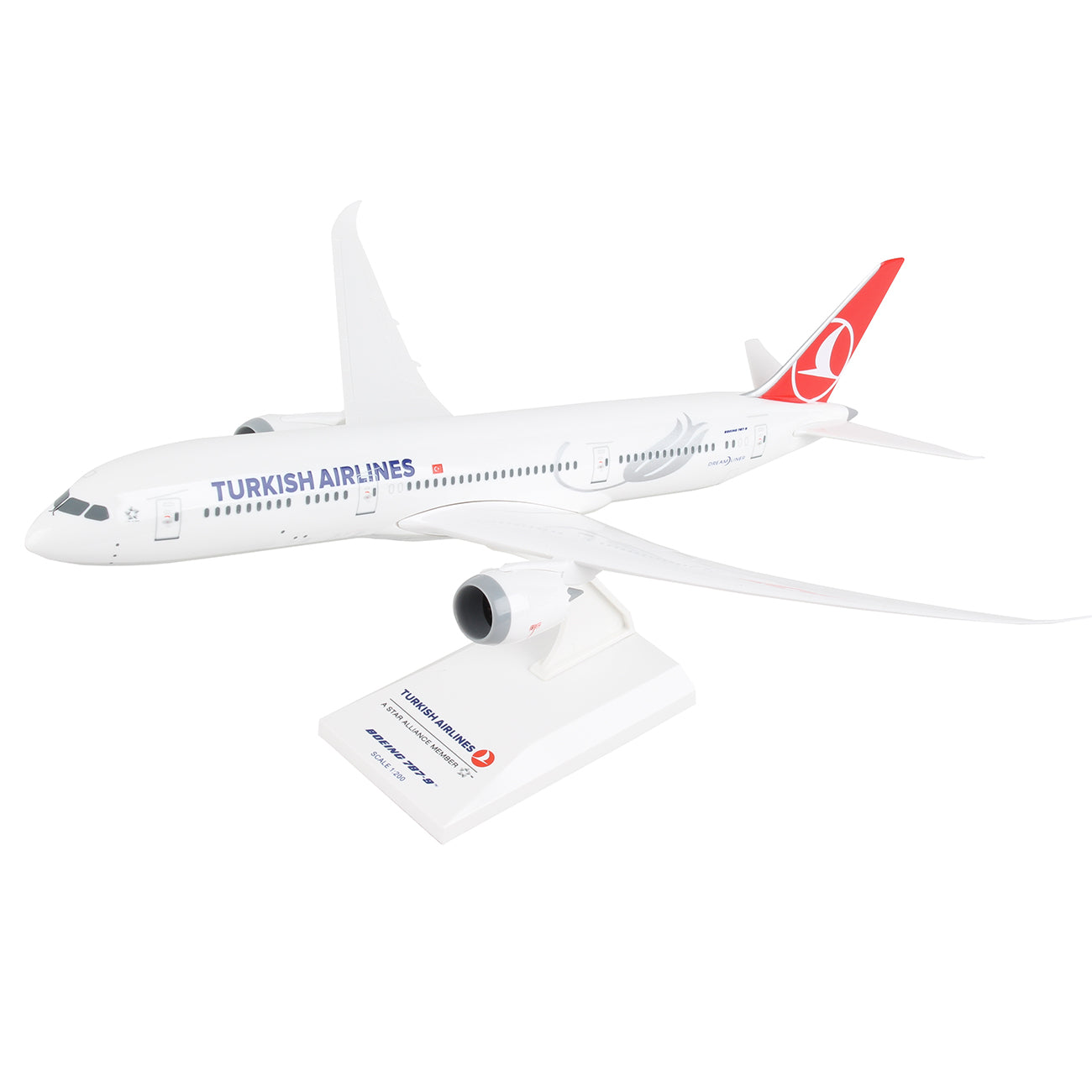 The Daron Turkish Airlines Boeing 787-9 1:200 Model features authentic markings, a white body with blue lettering, a red tail logo, and comes displayed on a white stand.