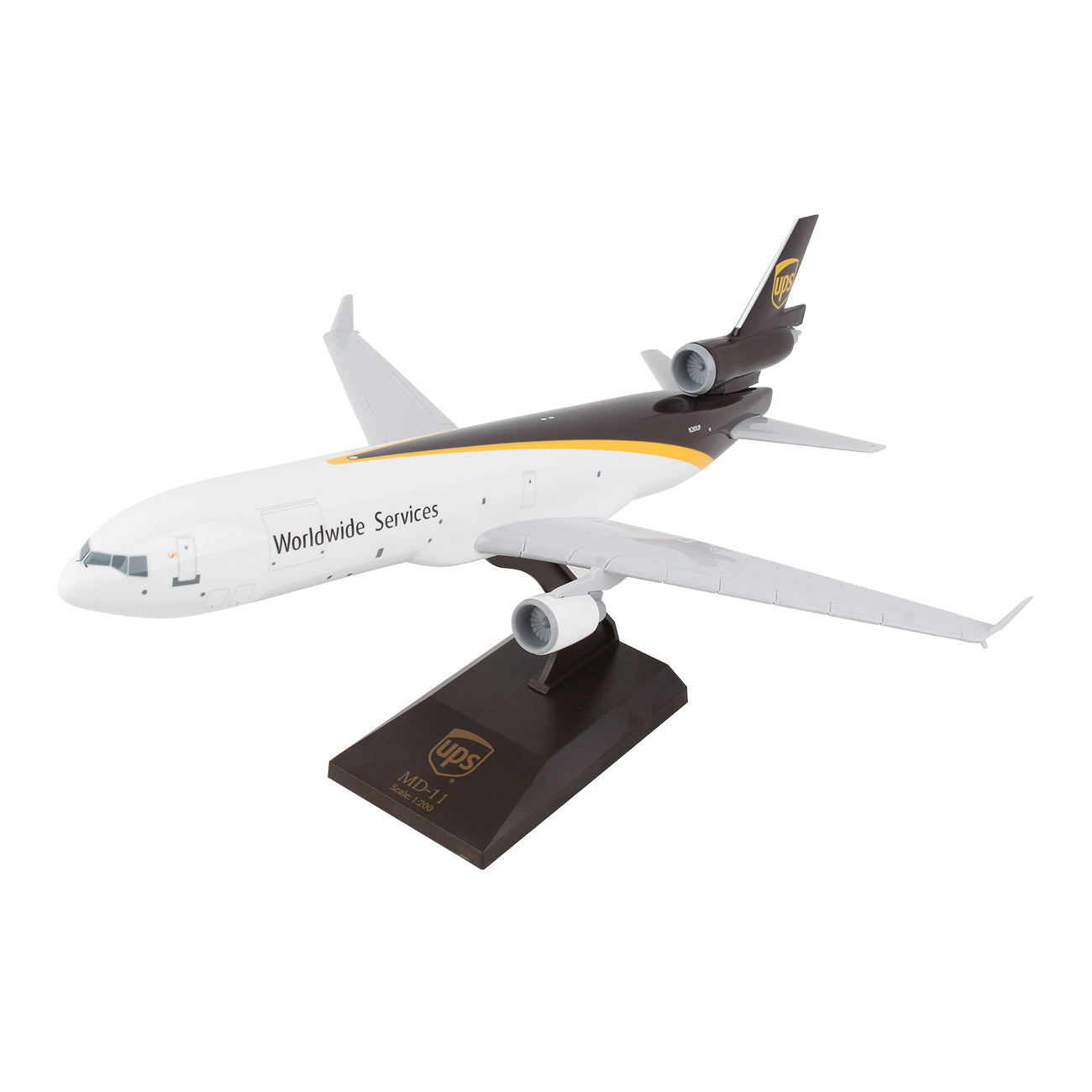 The Daron UPS Boeing MD-11 1:200 Model features Worldwide Services and the UPS logo, a snap-fit design for easy assembly, and comes mounted on a black stand with a UPS emblem. The white model with brown and gold accents is ideal for collectors.