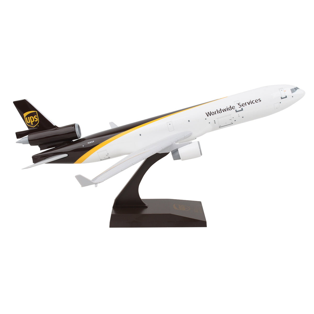 The Daron UPS Boeing MD-11 1:200 Model is a snap-fit collectible airplane with Worldwide Services on the side, brown and gold accents, and the UPS logo, mounted on a black display stand.