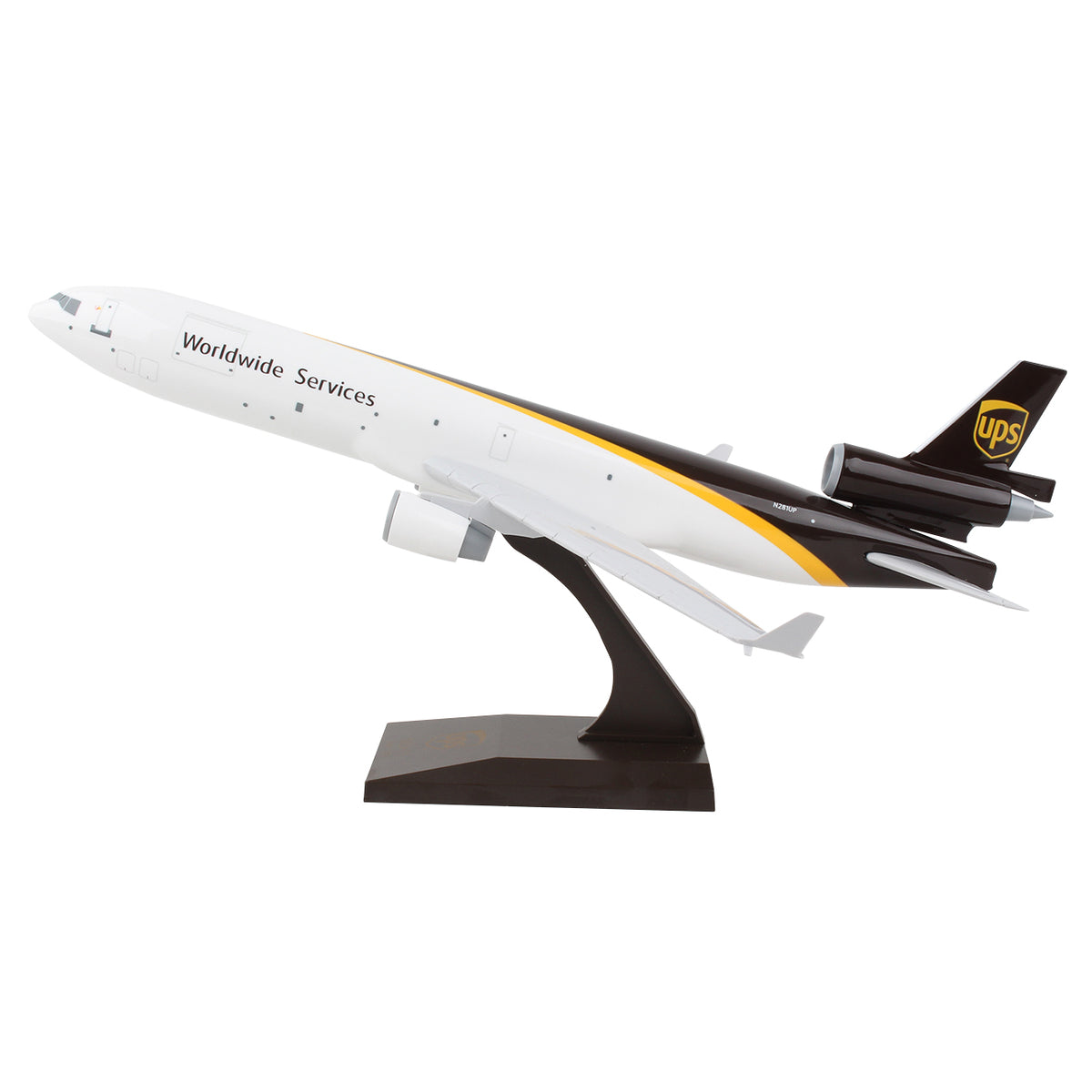 The Daron UPS Boeing MD-11 1:200 Model features UPS livery with "Worldwide Services" on the fuselage, a snap-fit white body with brown and gold accents, and comes mounted on a brown display stand, angled as if taking off.