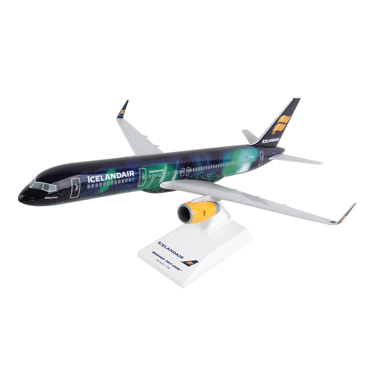 The Daron Icelandair Boeing 757-200 Hekla 1:150 Model is crafted from injection molded plastic, showcasing an aurora borealis design on a dark blue and green fuselage. It comes with a display stand featuring the Icelandair logo.