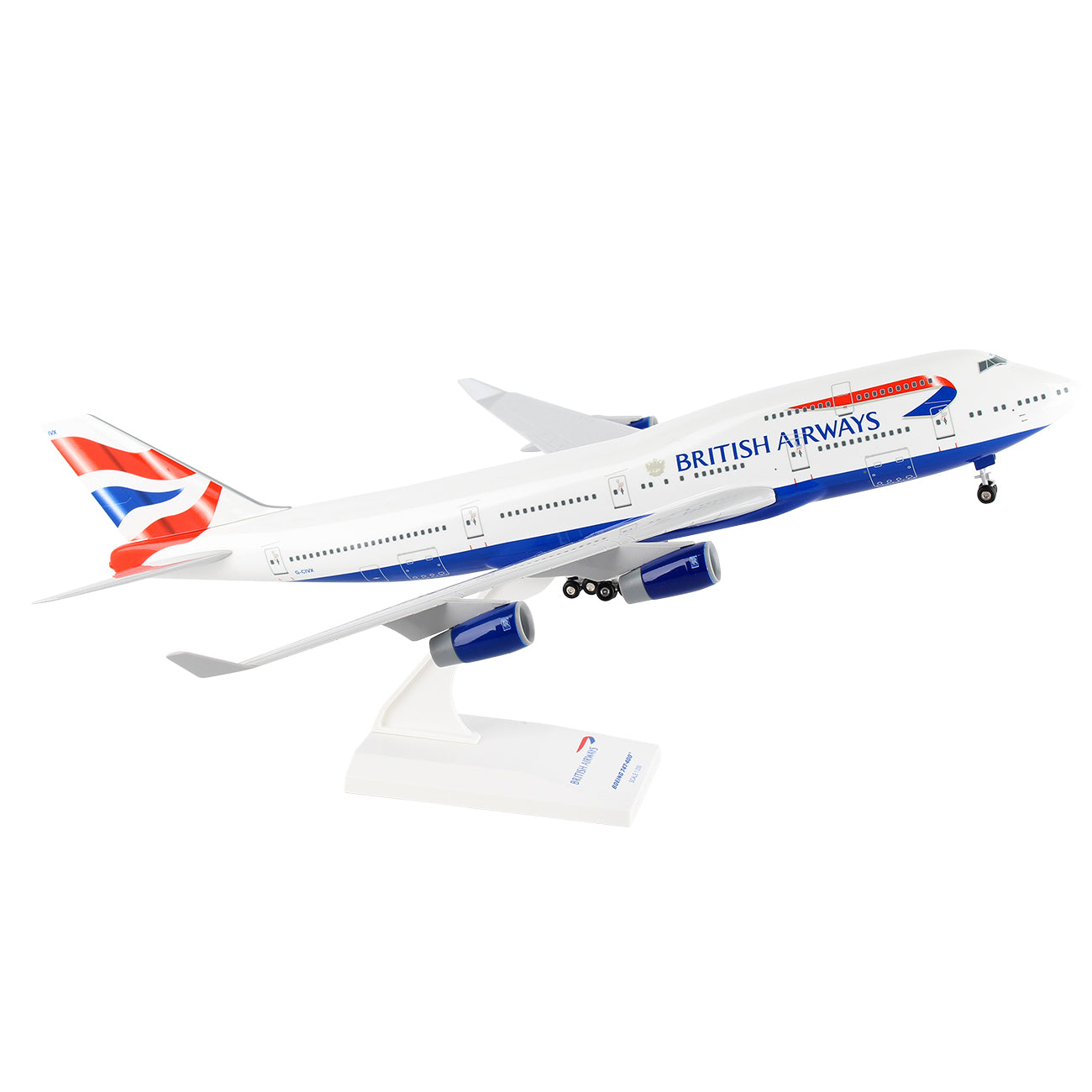 The Daron British Airways Boeing B747-400 1:200 Model is a diecast collectible airplane displayed on a white stand, shown against a plain background and angled upward as if taking off.