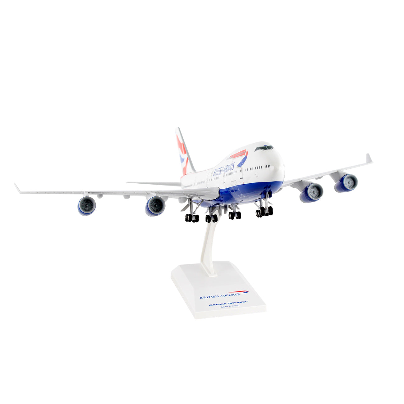 The Daron British Airways Boeing B747-400 1:200 Model is shown on a white stand, viewed from the front at an angle, and features blue and white livery with red tail accents.