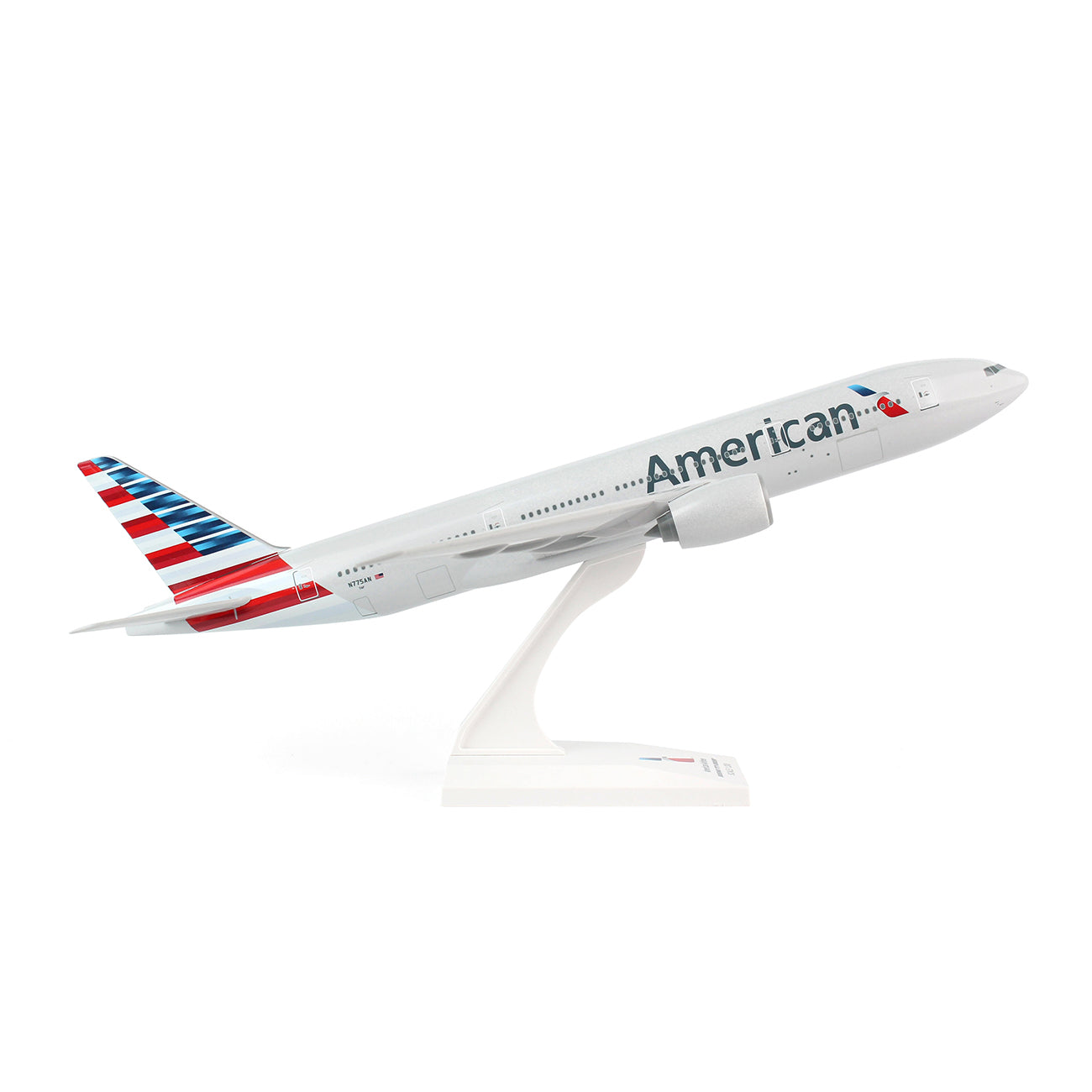 The Daron American Airlines Boeing 777-200 1:200 Model features a snap-fit design, classic livery with red, white, and blue tail stripes, and comes mounted on a white stand angled for a takeoff display—ideal for collectors.