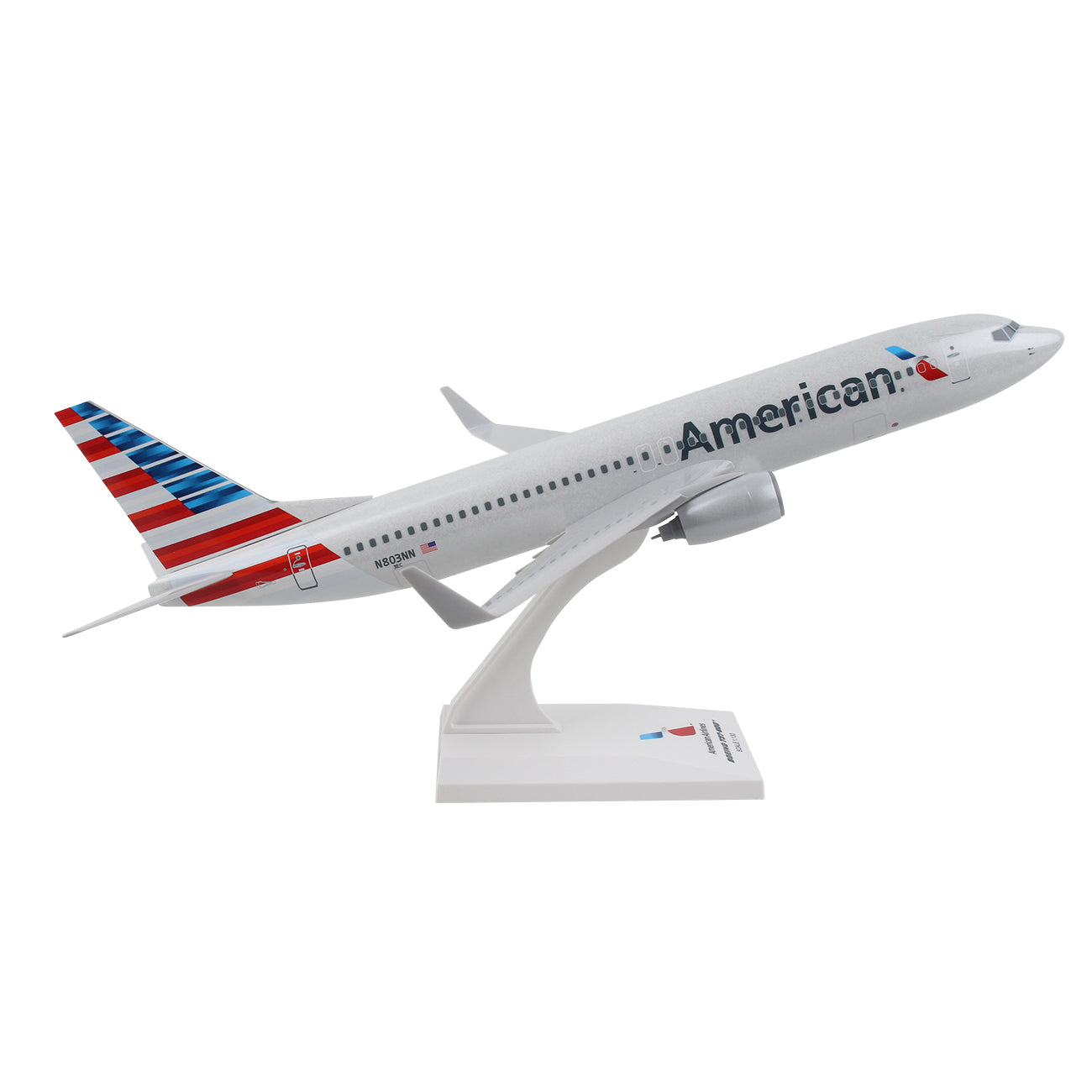 The Daron American Airlines Boeing 737-800 1:130 Model is a true-to-scale replica adorned in American Airlines livery. It features detailed graphics on a white body, with the iconic red and blue tail design and logo, perched on a stand to simulate flight.