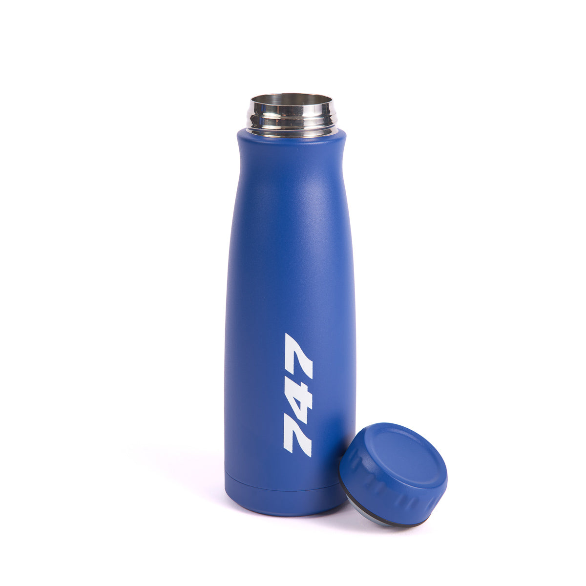 A blue insulated Boeing 747 Stratotype Water Bottle from The Boeing Store, featuring Boeing 747 elegantly printed in white, stands upright with its cap beside it on a white surface. The caps interior reveals a shimmering metal lining—ideal for aviation enthusiasts.