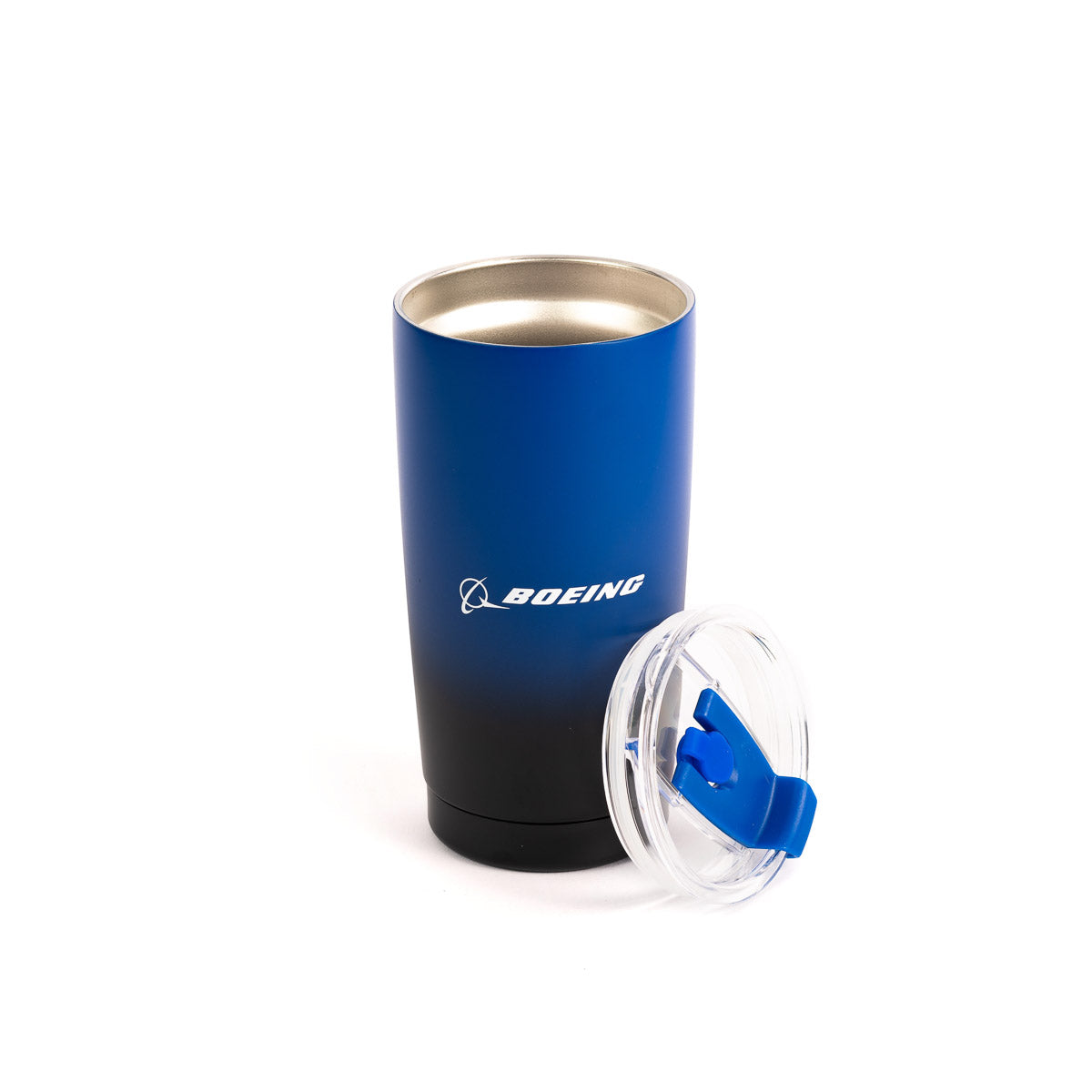 The Boeing Store's blue and black stainless steel Boeing Ombre Tumbler is shown empty on a white background with its clear, leak-proof lid—featuring a blue sliding closure—removed and placed beside it.
