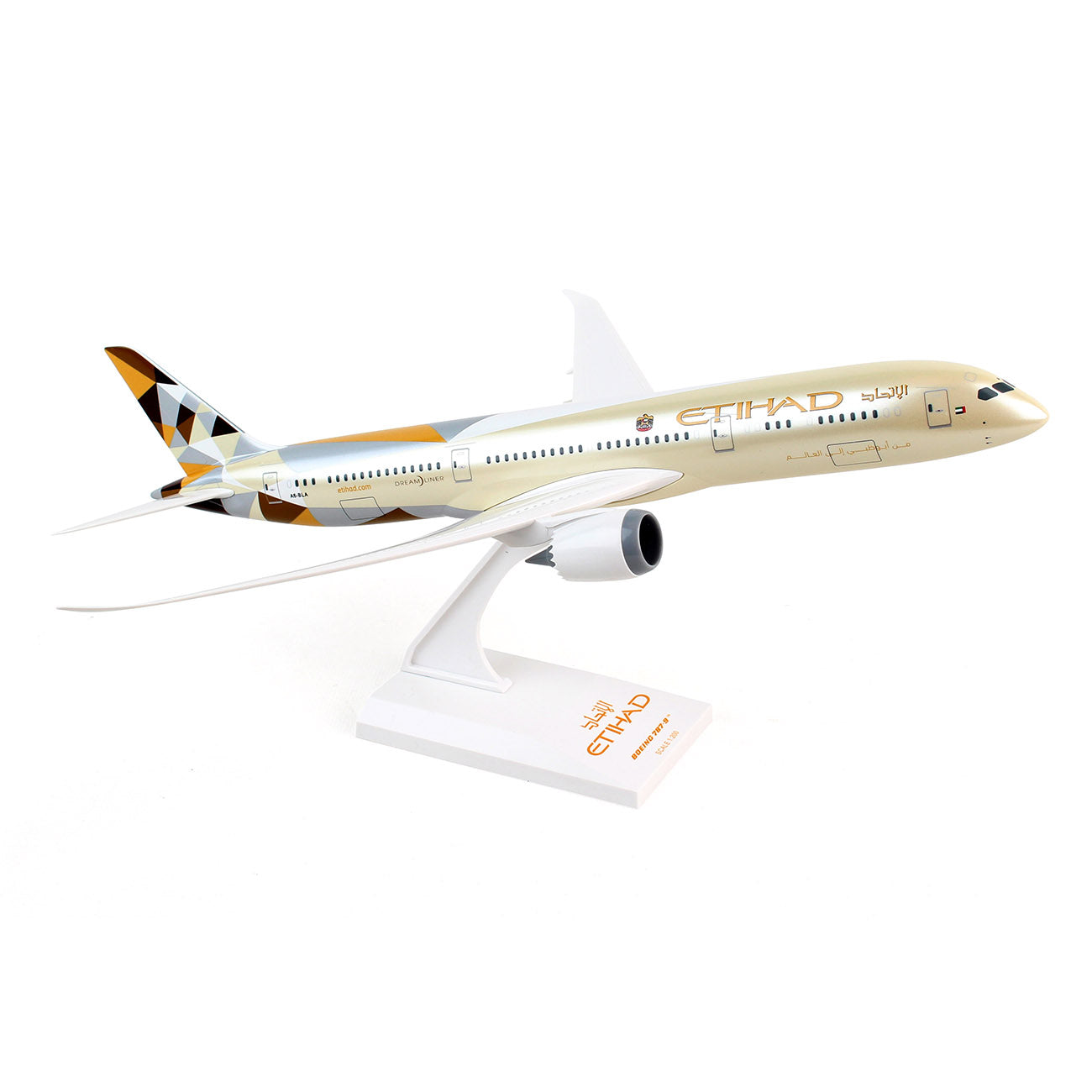 The Daron Etihad Airways Boeing 787-9 1:200 Model is a collectors item featuring a gold and white color scheme, geometric tail design, and intricate details of the passenger aircraft in flight on a stand.