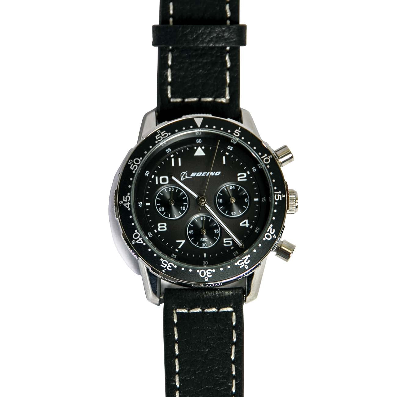The Boeing Stores Boeing Black Leather Watch features a stainless steel case resistant up to 10 ATM, a dial with the Boeing logo, three subdials, and white numerals on the bezel. It has a black strap with white stitching and is powered by precise Japanese movement.