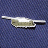 The Boeing Stores Boeing Illustrated CH-47 Lapel Pin is a small, silver-tone pin shaped like a military helicopter with two rotors, features an epoxy finish, and is attached to blue textured fabric.